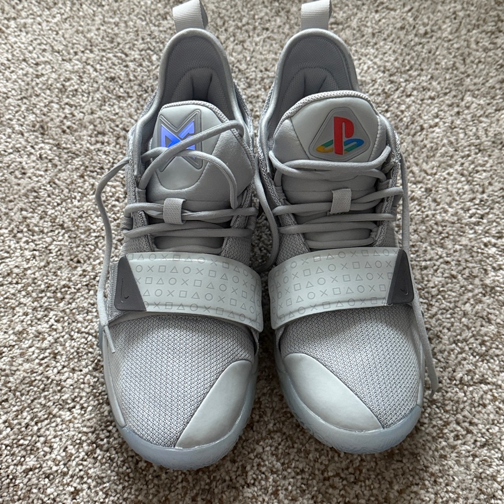 Nike Gray Athletic Shoes with PlayStation Logo